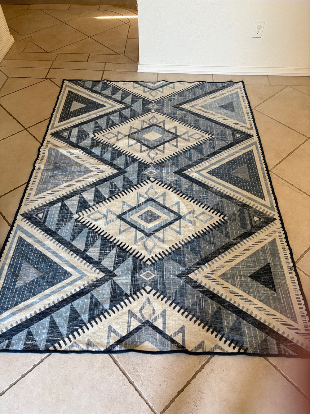 Ruggable Decorative Geometric Area Rug in Blue and white 58" by 81.5"